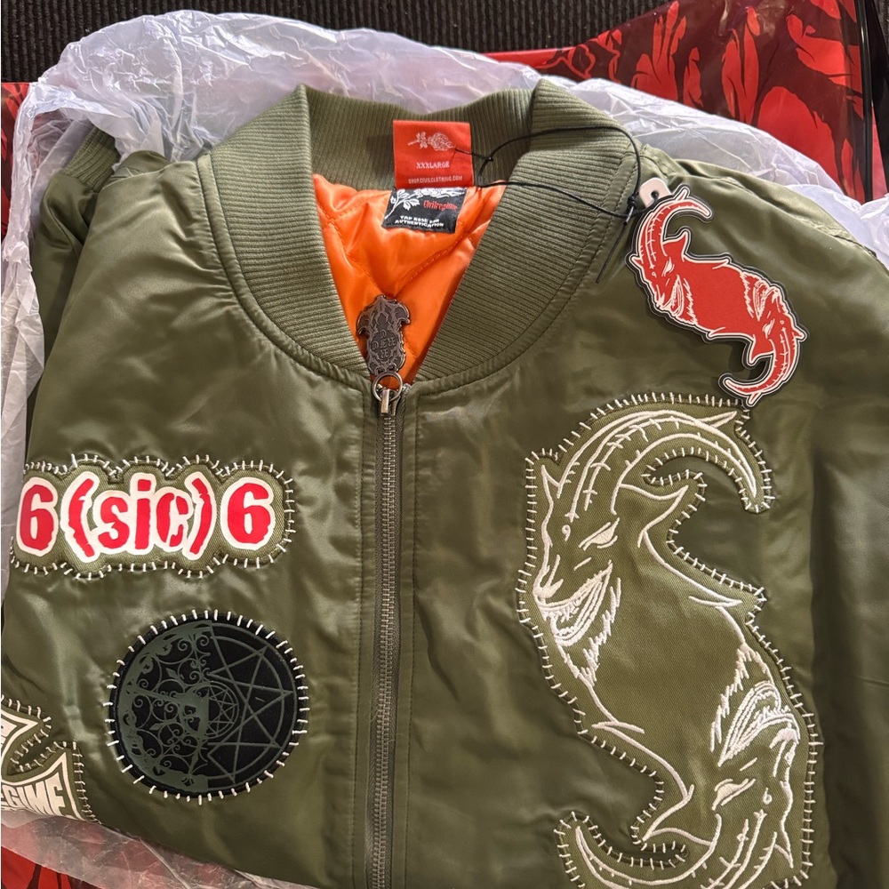 Green Bomber Jacket with Goat and Patch Details